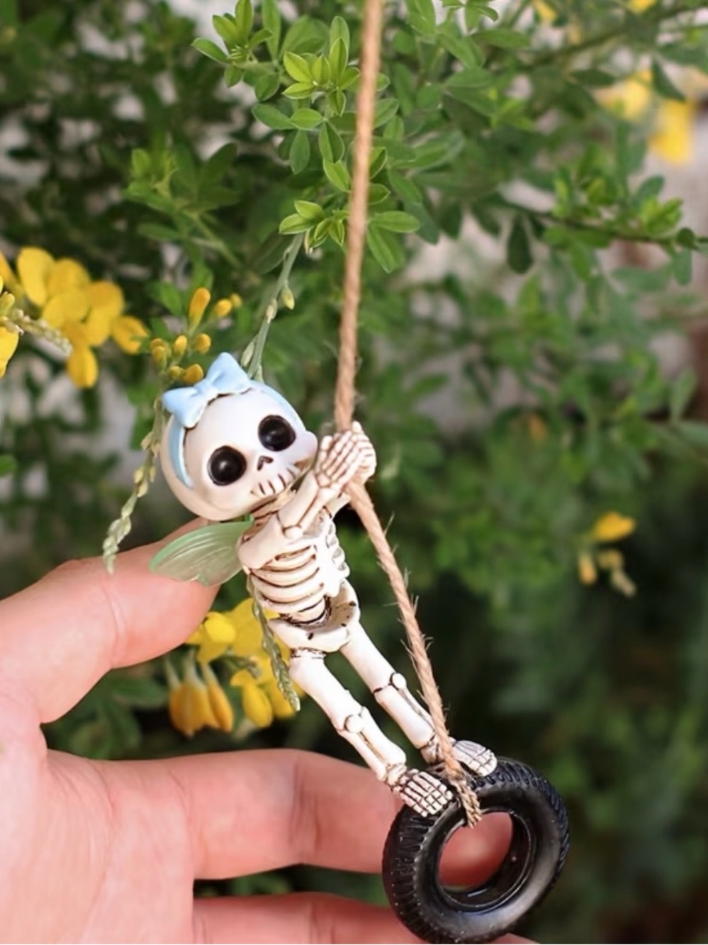 Cute Skeleton Fairy Toy with Blue Bow and Black Tire Swing - Kids Toys